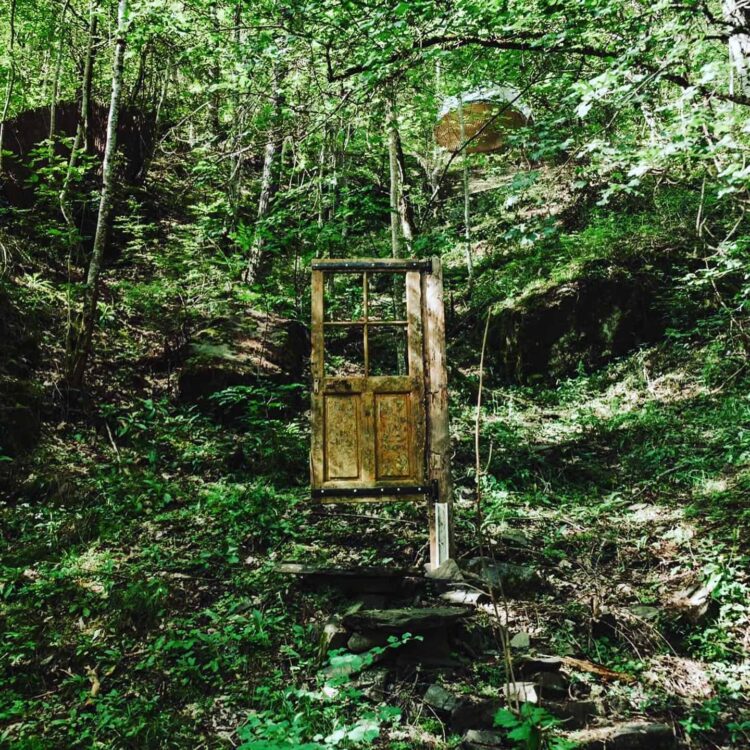 Door in the forest of the crazy water rafting base